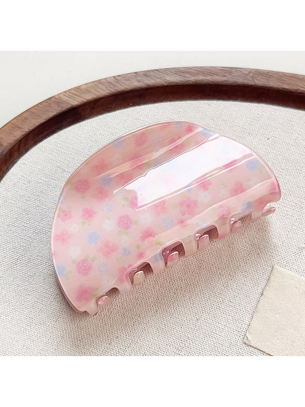 Beau Sweet Pink Floral Print Hair Claw Clip shown from top angle