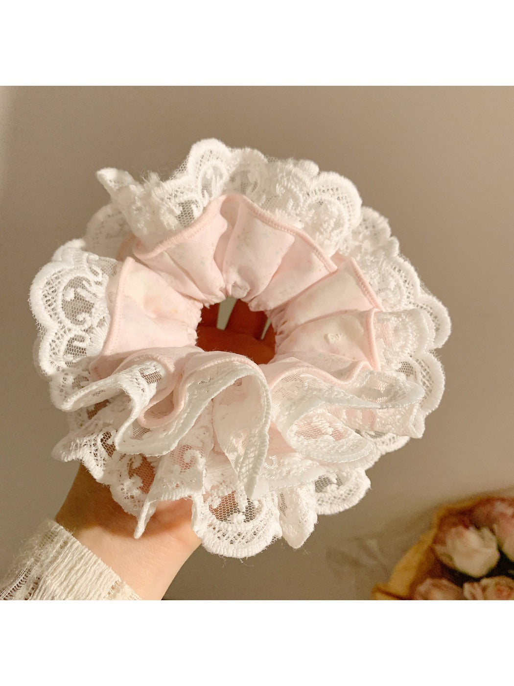 Gifty printed scrunchie in soft pastel colors with floral design close-up