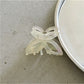 Beau Misty Acetate Butterfly Hair Clip in soft lighting emphasizing color and texture