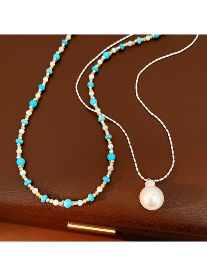 Nozari - Layered Beaded Round Pendant Necklace