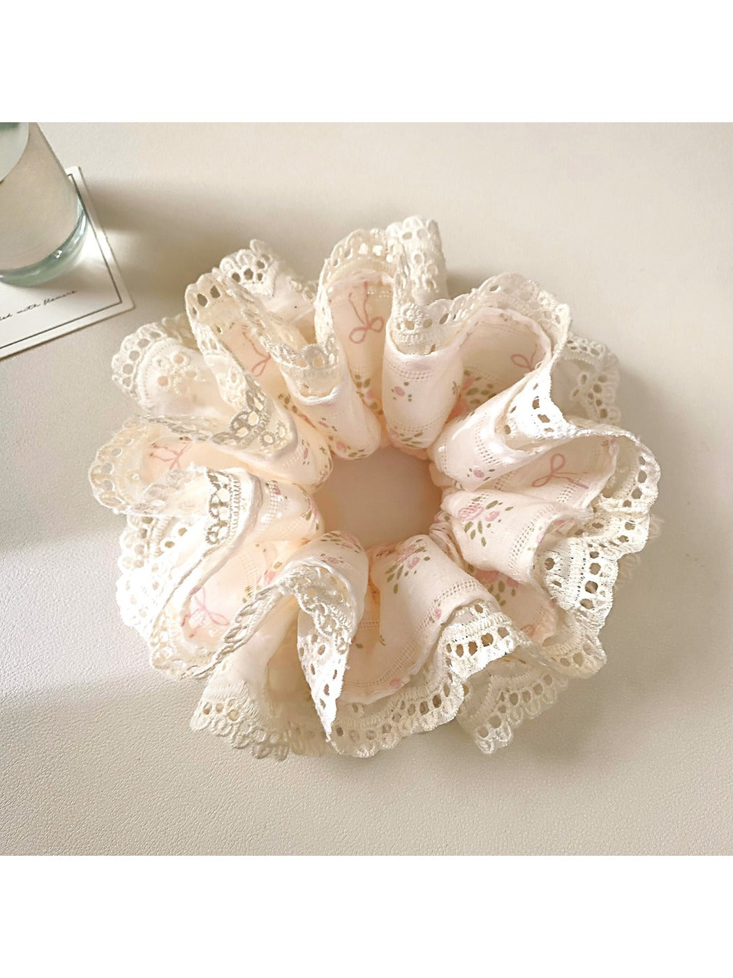 Gifty Sweet Bow Print Ruffled Scrunchie displayed on a white background showing ruffled texture