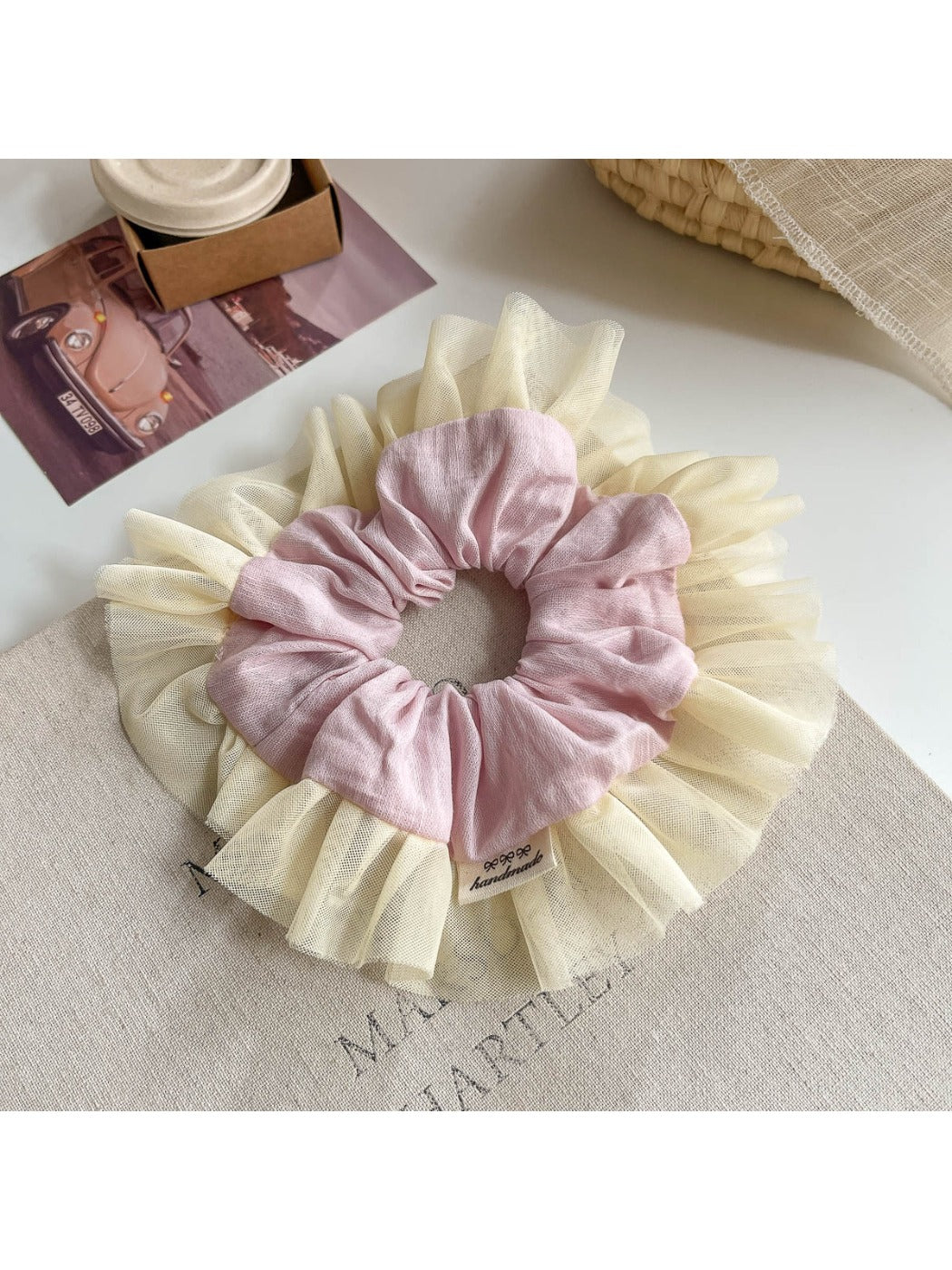 Gifty Sweet Color Block Tulle Scrunchie next to matching pastel accessories