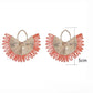 Side view of Earedge raffia woven fan shape earrings showing texture and weave