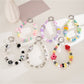 Keypus - Cartoon Acrylic Bow Star Beaded Phone Charm