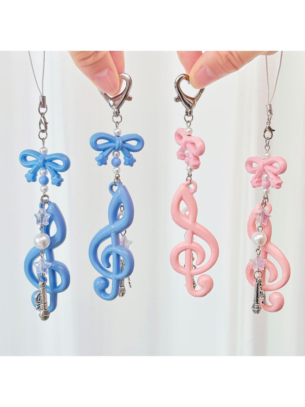 Close-up of Keypus cute music note keychain on a white background