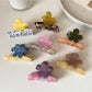 Close-up of Beau Half Moon Flower Hair Claw Clip showing flower details and clasp mechanism