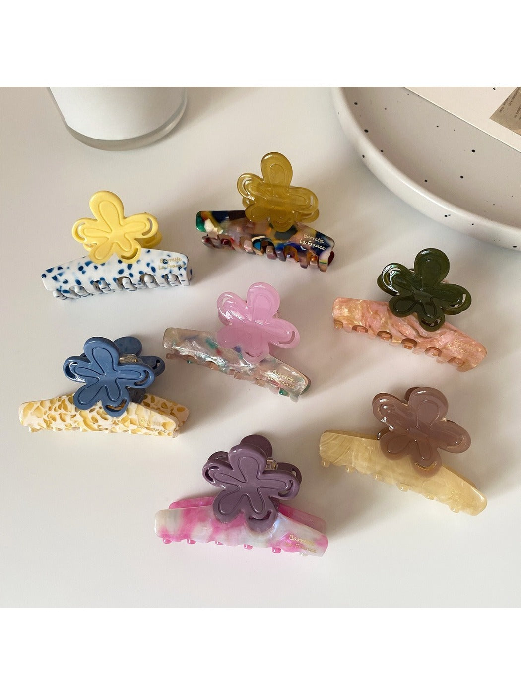 Close-up of Beau Half Moon Flower Hair Claw Clip showing flower details and clasp mechanism