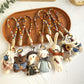 Keypus fabric cartoon doll bag charm keychain with smiling face and colorful outfit