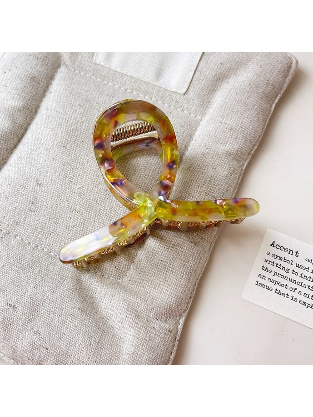 Beau vintage crisscross hair claw clip displayed on a white background