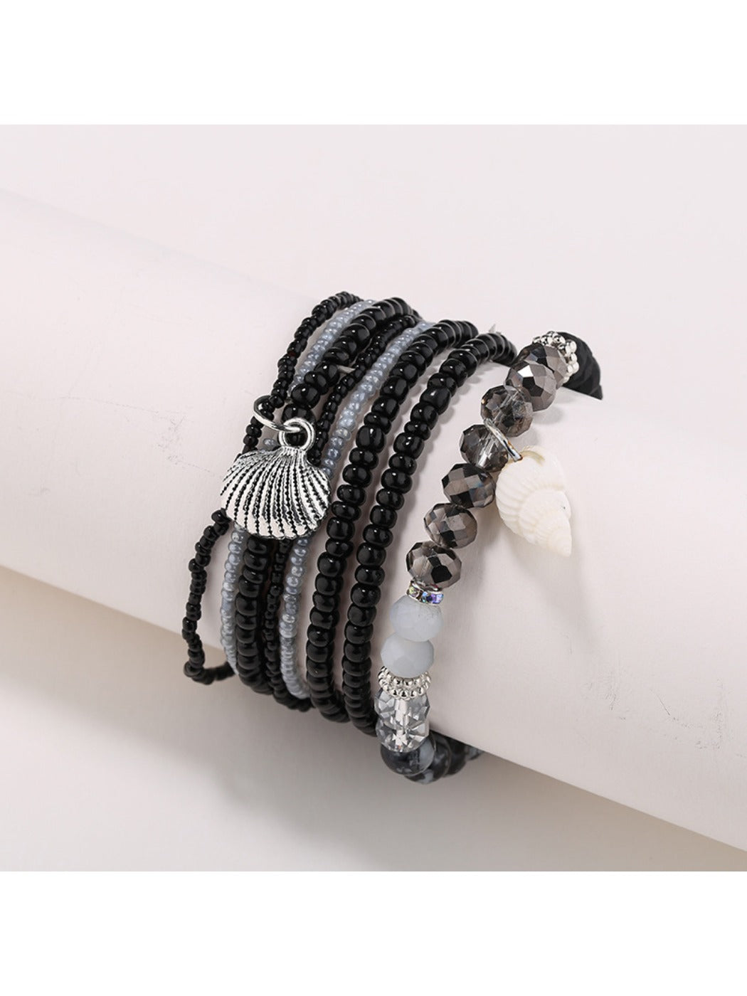 Lovra bracelet with gold and neutral beads styled with casual outfit
