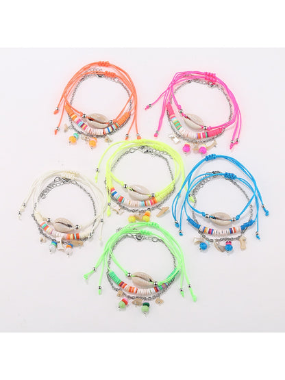 Lovra Earedge Ocean Style multi-row bracelet with blue and silver beads on a white background