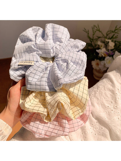 Gifty Lazy Style scrunchie showing textured fabric detail on white background