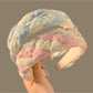 Close-up of Gifty Happy Lace headband showing delicate lace pattern and texture