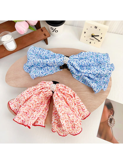 Side angle of Beau Polka Dot Bow Claw Clip showing bow detail