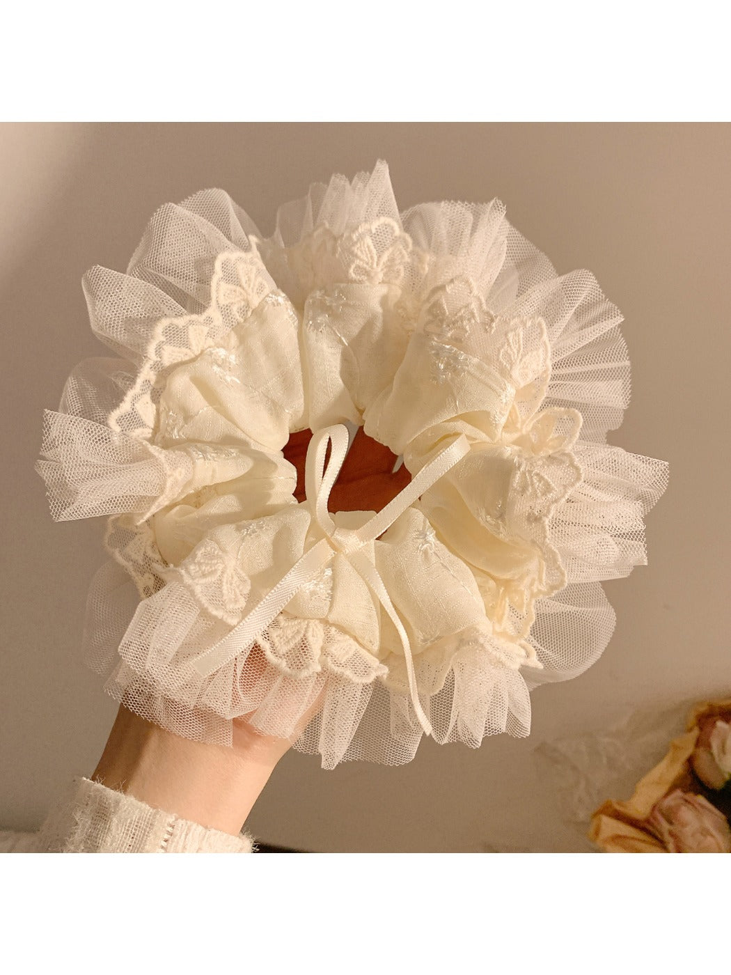 Side view of Gifty minimalist bow scrunchie highlighting bow shape