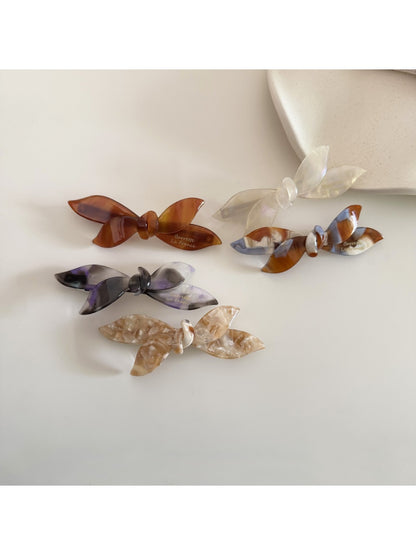 Top view of Beau retro bow hair clip highlighting bow shape and pattern