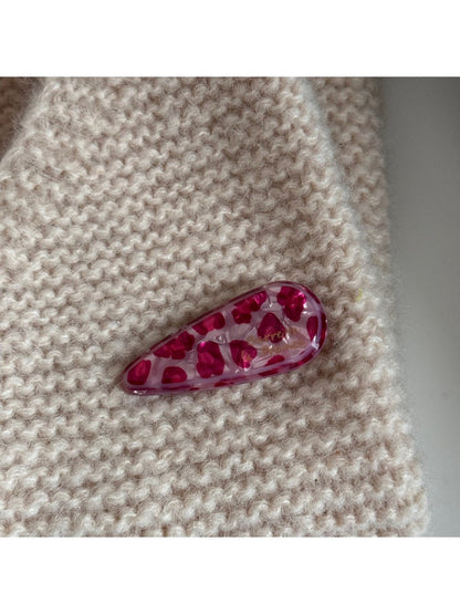 Beau pink leopard print hair clip shown from top angle