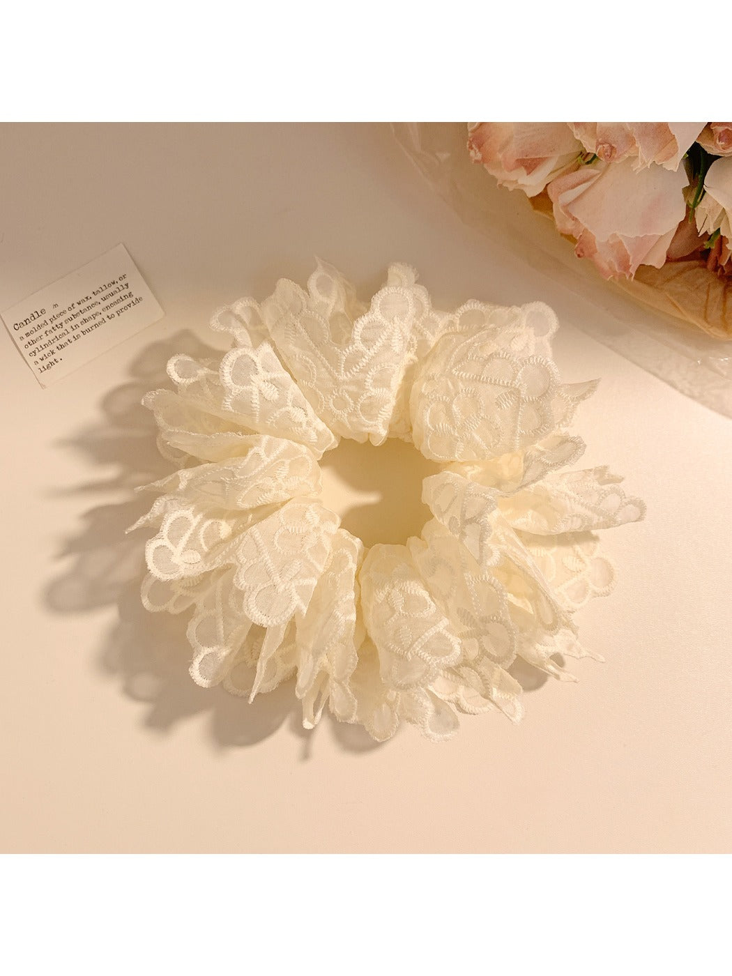 Elegant white double layer scrunchie displayed on a plain background