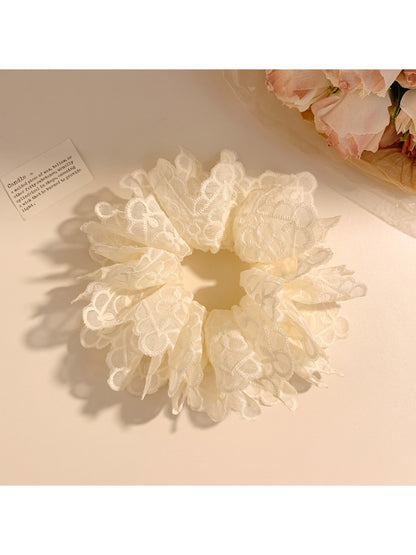 Elegant white double layer scrunchie displayed on a plain background