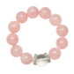 Lovra pink beaded crystal bracelet worn on wrist with soft lighting