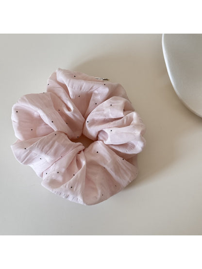Gifty soft polka dot scrunchie displayed on a white background showing full circular shape
