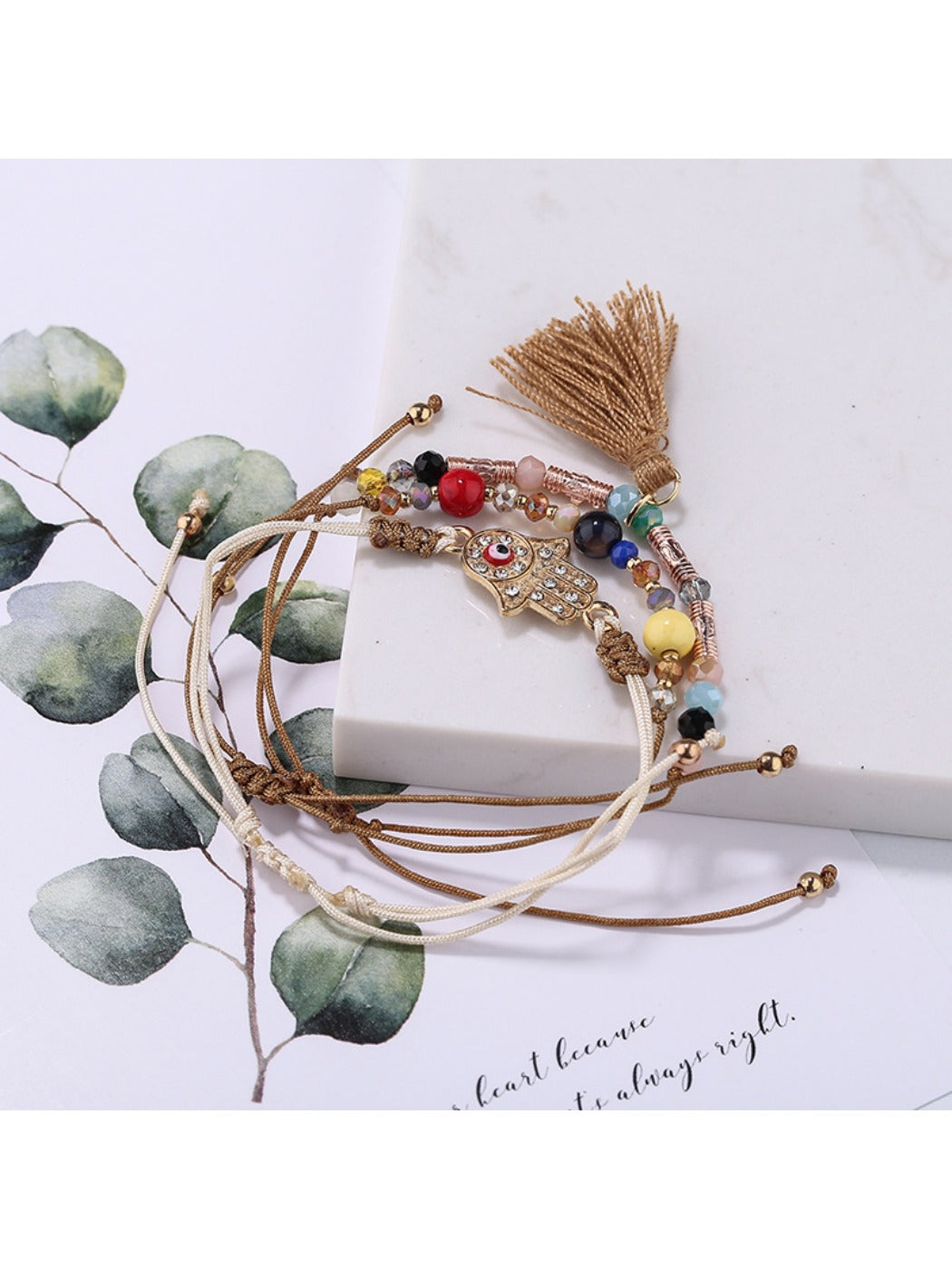 Lovra alloy charm tassel pendant bracelet with clasp visible