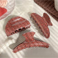 Side view of Beau plaid strawberry print hair claw clip with metal clasp