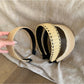 Close-up of Gifty wide bohemian headband showing woven fabric texture and pattern