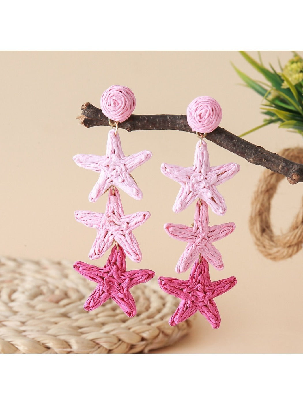 Earedge star pendant earrings displayed with matching necklace