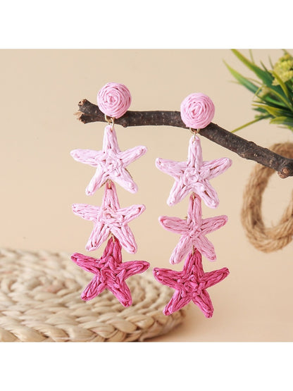 Earedge star pendant earrings displayed with matching necklace