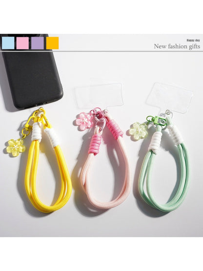 Colorful flower-shaped rope keychain with multiple vibrant petals on a white background