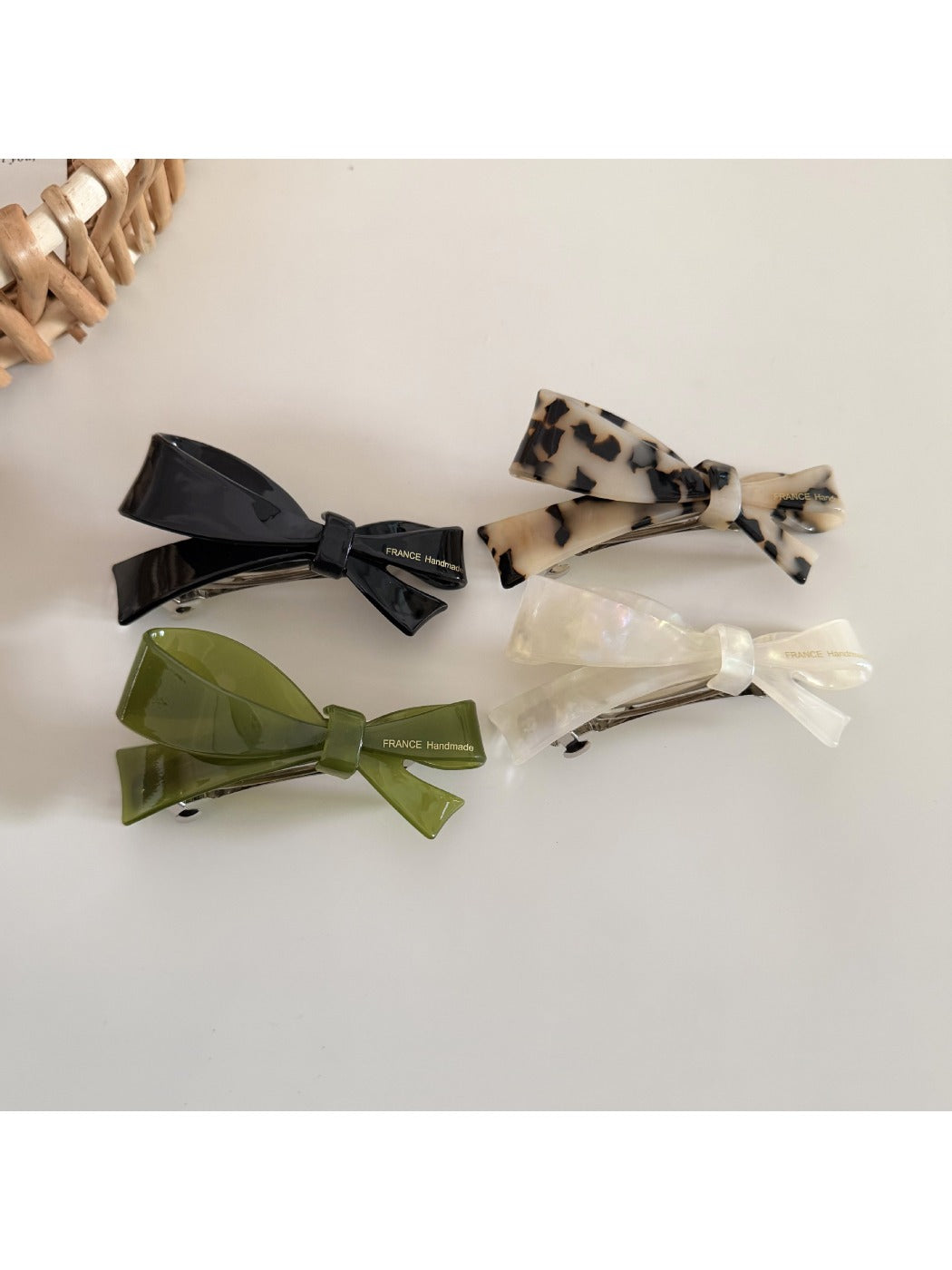 Side view of Beau irregular bow hair clip highlighting clip mechanism
