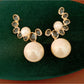 Earedge - Modern Curved Round Drop Look Stud Earrings