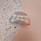 Beau gradient acrylic hair clip displayed with matching accessories