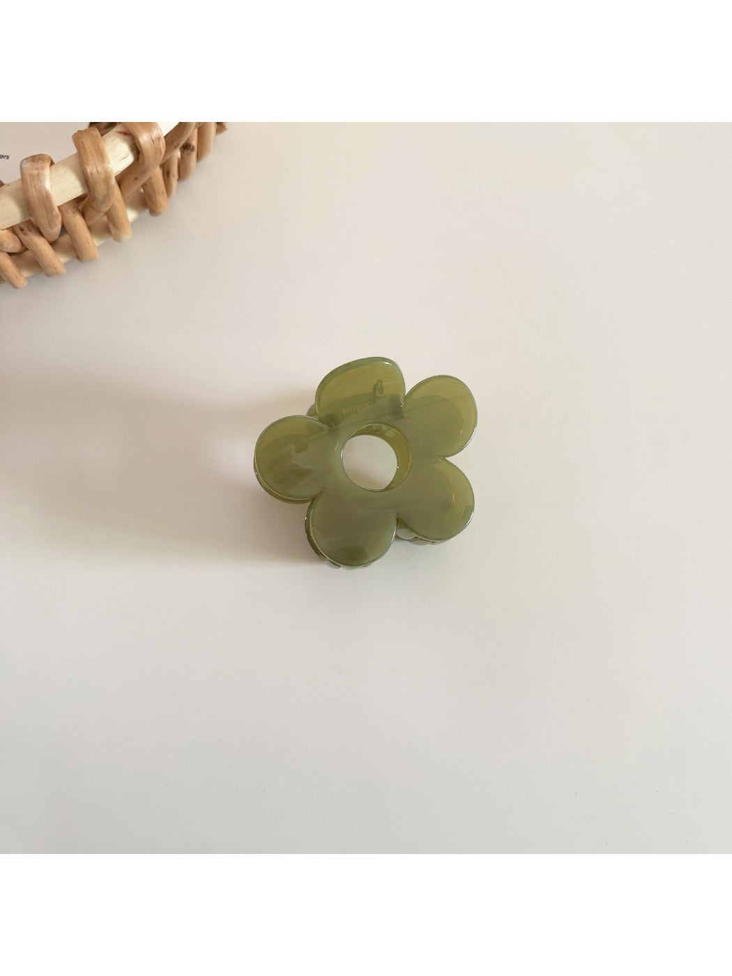 Beau flower hair clip displayed on white background with soft shadows