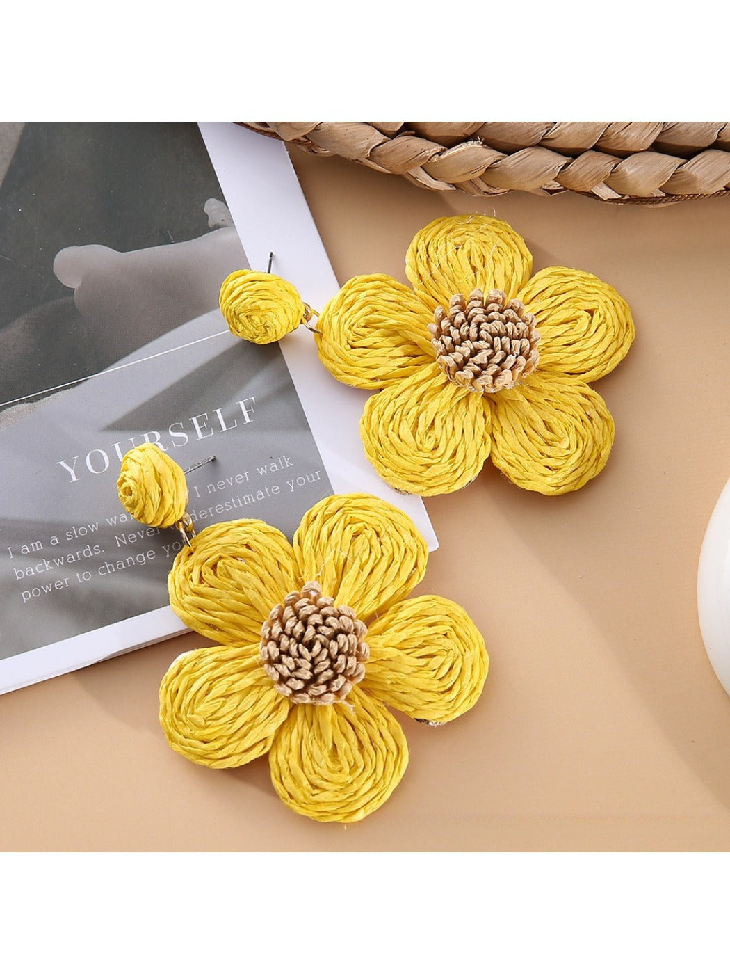 Pair of Earedge minimalist flower drop earrings with gold finish