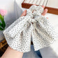 Gifty vintage floral scrunchie paired with casual outfit