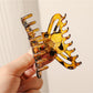 Beau - Elegant Flower Shaped Long Strip Claw Clip