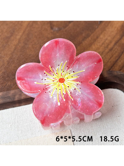 Beau floral claw clip styled in hair demonstrating size and secure hold