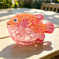Multiple Beau sea animal claw clips in various pastel colors arranged together