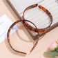 Close-up of leopard print fabric and texture on the Gifty headband