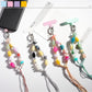 Colorful resin bead keychain with a gold keyring on a white background