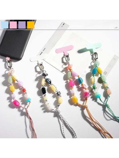 Colorful resin bead keychain with a gold keyring on a white background