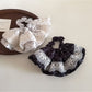 Gifty vintage polka dot hair tie displayed flat on a white background