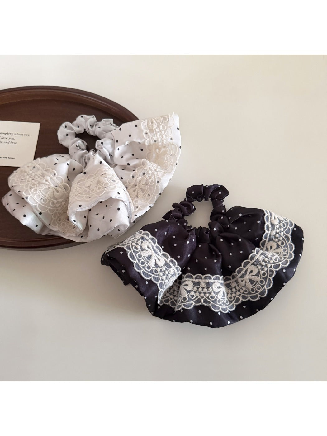 Gifty vintage polka dot hair tie displayed flat on a white background