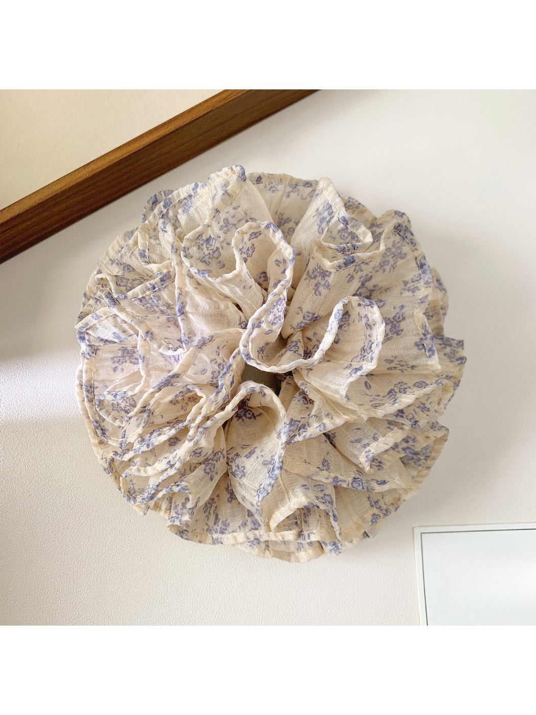Side view of Gifty vintage multi layer tiny floral scrunchie showing fabric layers and floral pattern