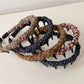 Side view of vintage plaid wrap headband showing twisted knot design