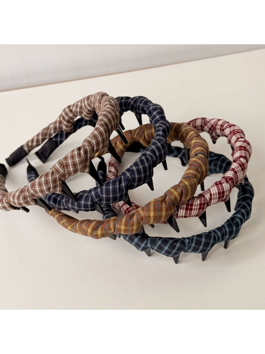 Side view of vintage plaid wrap headband showing twisted knot design