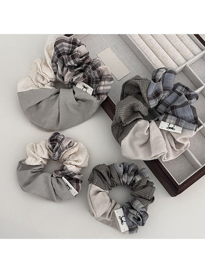 Gifty vintage patchwork plaid ruched scrunchie on a white background