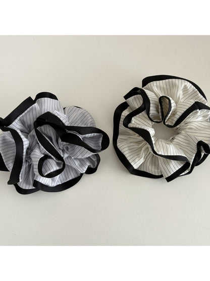 Side view of Gifty Neat Silky Zesty Scrunchie highlighting gathered fabric design